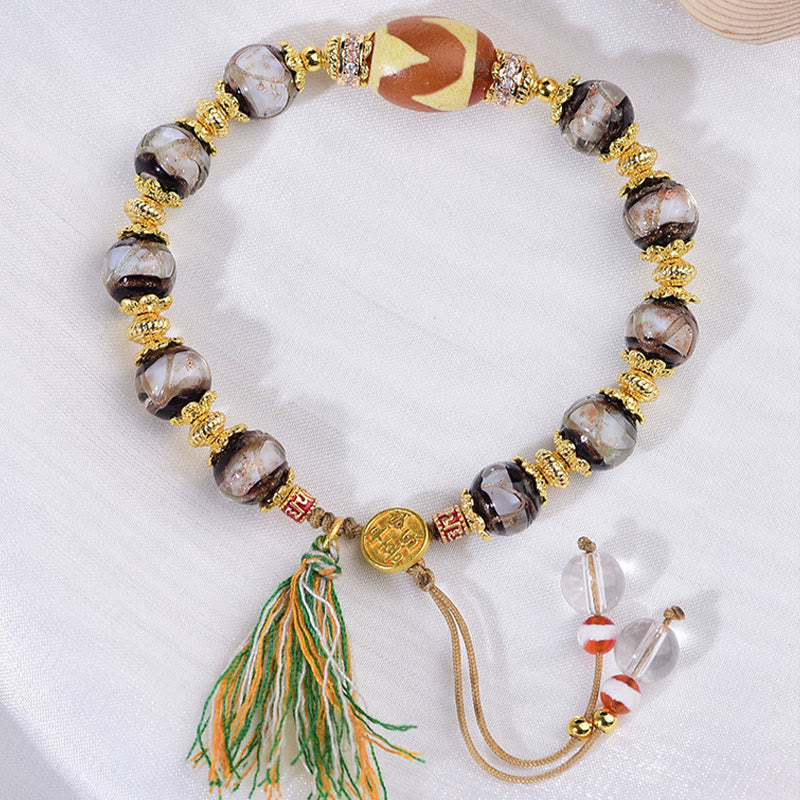 Braccialetto delle benedizioni con perline di vetro Dzi Buddha Stones Liuli - image 1