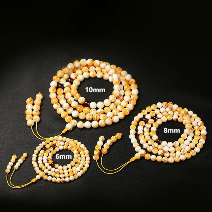 Mala tibetano in ambra bianca e gialla con 108 perle Buddha Stones - image 9