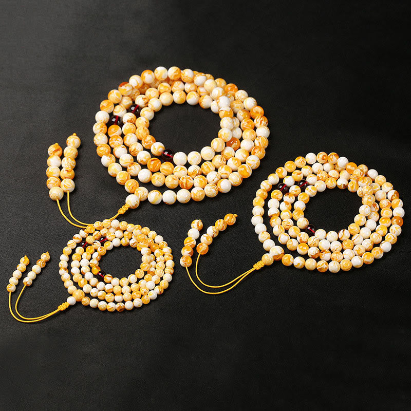 Mala tibetano in ambra bianca e gialla con 108 perle Buddha Stones - image 8
