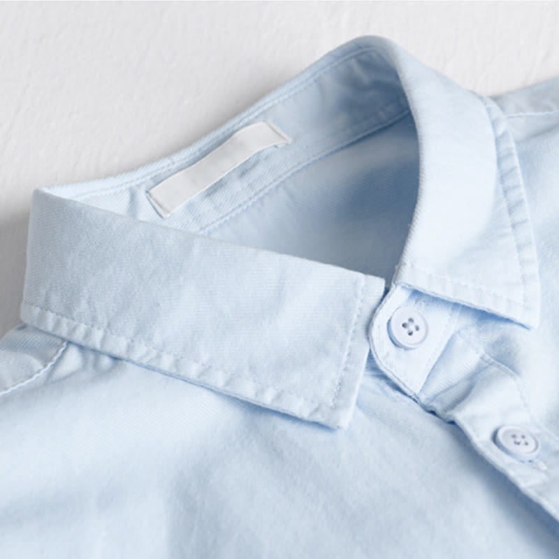 Camicia da uomo in cotone a maniche lunghe con colletto rialzato, con bottoni decorativi e tasca abbottonata, modello Buddha Stones Spring Solid - image 1