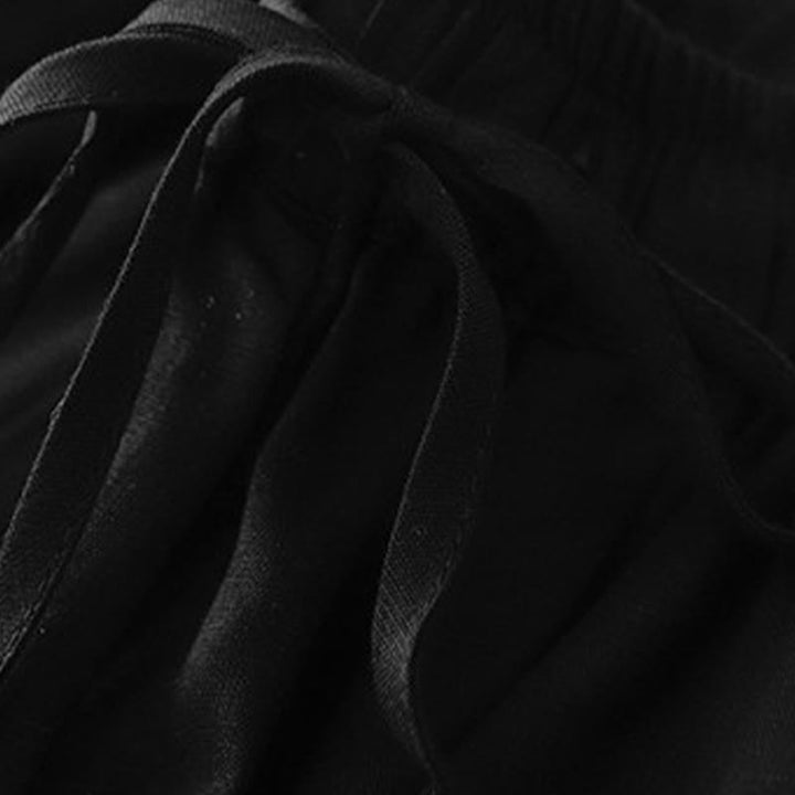 Pantaloni capri corti harem da donna con elastico in vita e tasche, modello estivo Buddha Stones. - image 12
