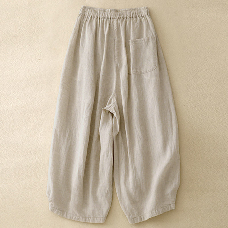 Pantaloni capri corti harem da donna con elastico in vita e tasche, modello estivo Buddha Stones. - image 1