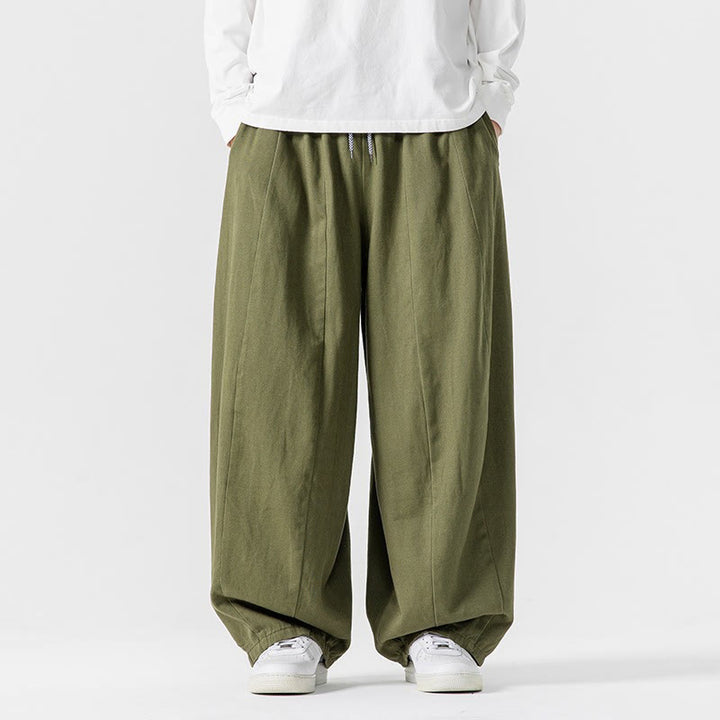 Pantaloni harem da uomo in cotone elasticizzato con tasche, tinta unita, modello Buddha Stones Fall - image 1