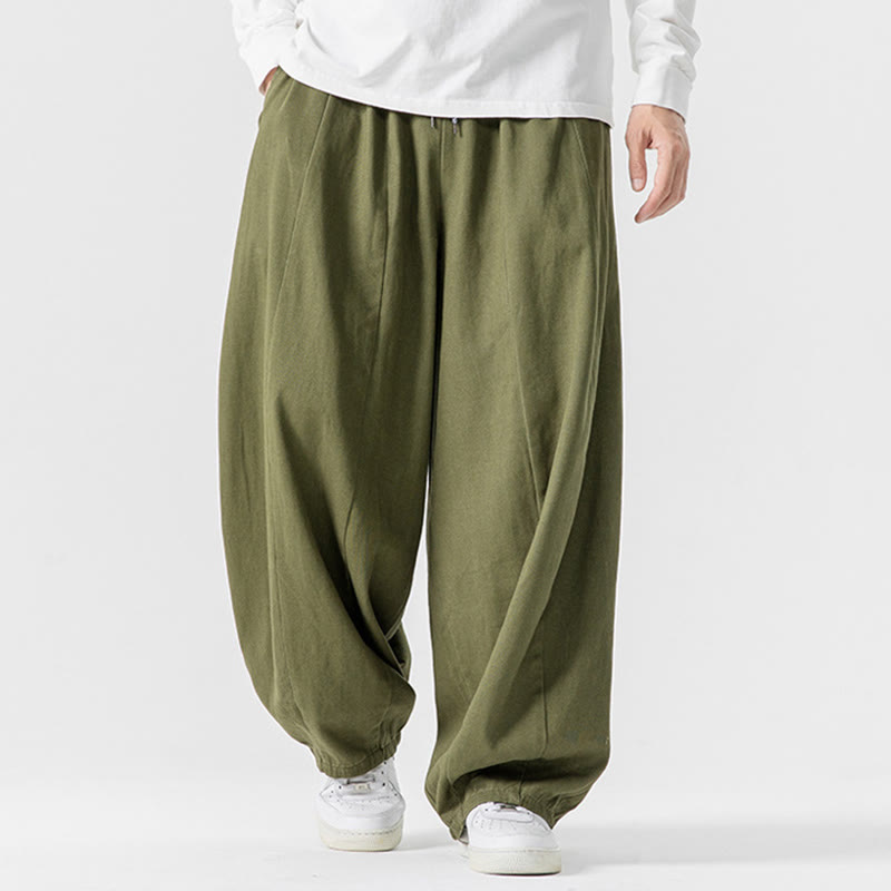 Pantaloni harem da uomo in cotone elasticizzato con tasche, tinta unita, modello Buddha Stones Fall - Verde oliva - US/UK/AU46, EU56 (5XL) - image 0