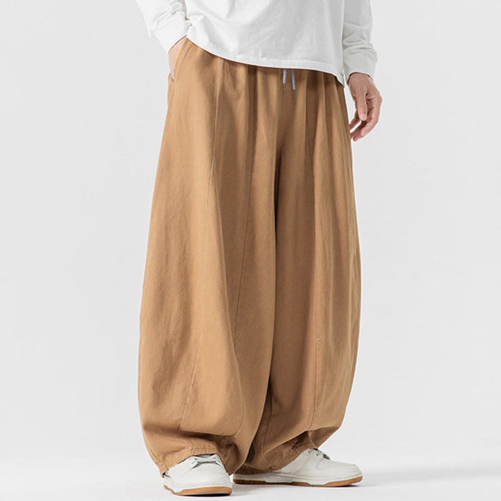 Pantaloni harem da uomo in cotone elasticizzato con tasche, tinta unita, modello Buddha Stones Fall - image 9