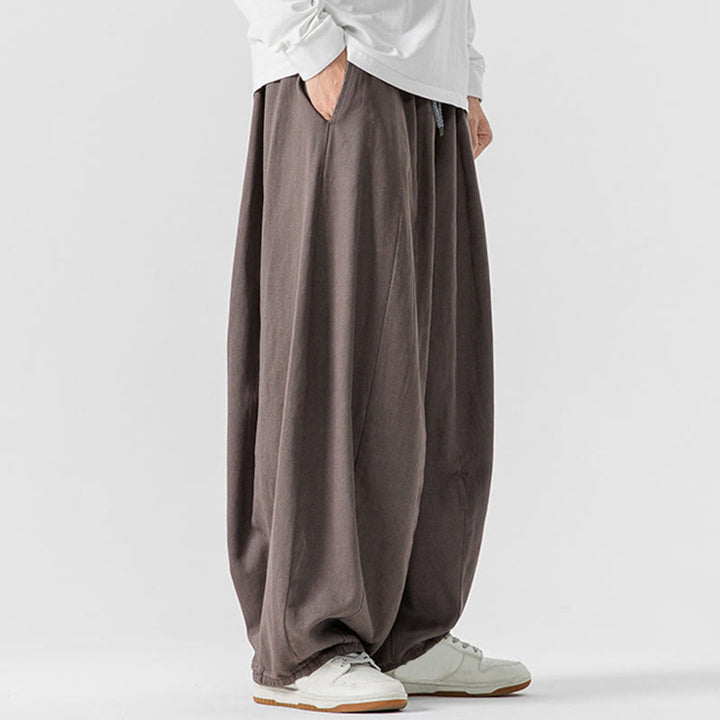 Pantaloni harem da uomo in cotone elasticizzato con tasche, tinta unita, modello Buddha Stones Fall - image 19