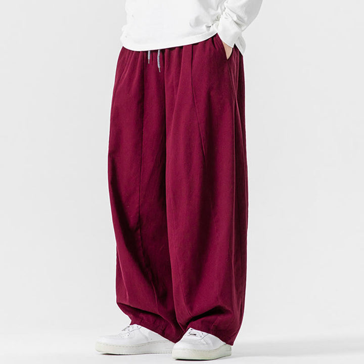 Pantaloni harem da uomo in cotone elasticizzato con tasche, tinta unita, modello Buddha Stones Fall - image 29
