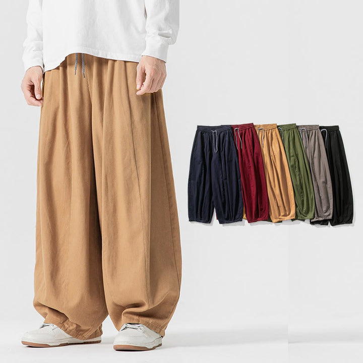 Pantaloni harem da uomo in cotone elasticizzato con tasche, tinta unita, modello Buddha Stones Fall - image 15