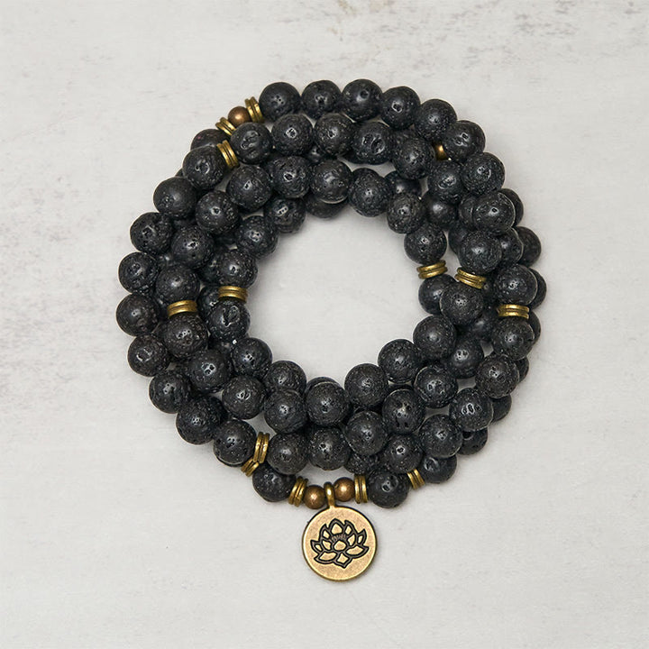 Buddha Stones, ciondolo con simbolo di loto retrò, perlina di roccia lavica, guarigione, nuovo inizio, mala - Roccia lavica - image 0