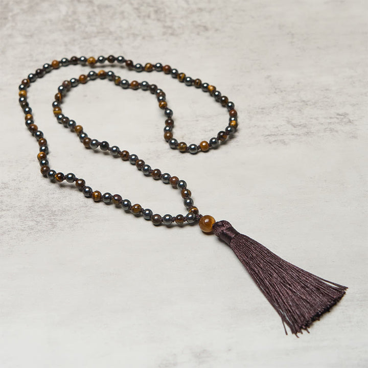 Mala con 108 Buddha Stones, occhio di tigre, ematite e nappa, coraggio e forza - image 2
