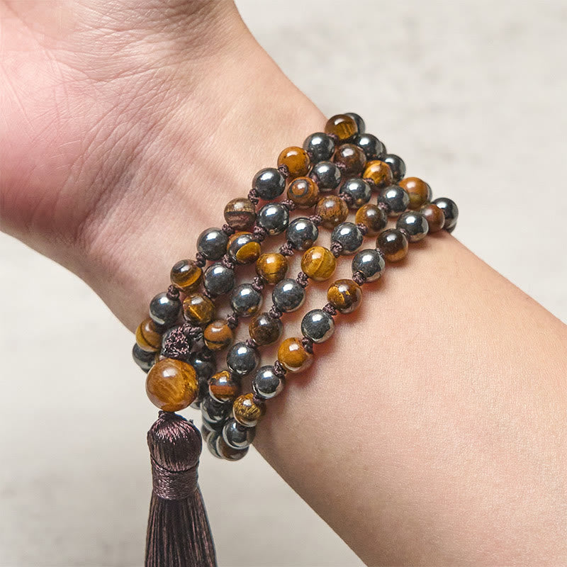 Mala con 108 Buddha Stones, occhio di tigre, ematite e nappa, coraggio e forza - image 3