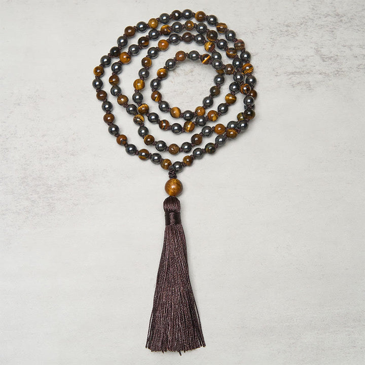 Mala con 108 Buddha Stones, occhio di tigre, ematite e nappa, coraggio e forza - image 1