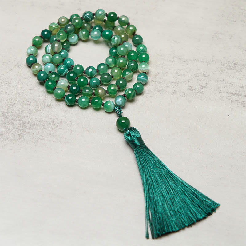 Braccialetto di protezione con Buddha Stones e nappa di malachite - image 1