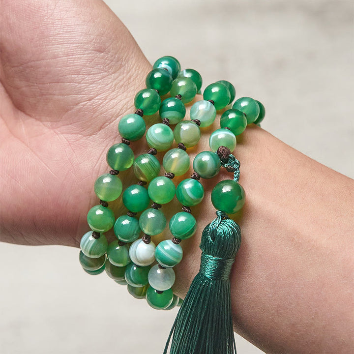 Braccialetto di protezione con Buddha Stones e nappa di malachite - image 3