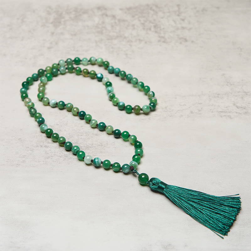 Braccialetto di protezione con Buddha Stones e nappa di malachite - image 2