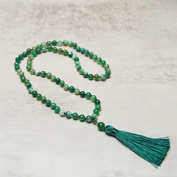 Braccialetto di protezione con Buddha Stones e nappa di malachite - image 2