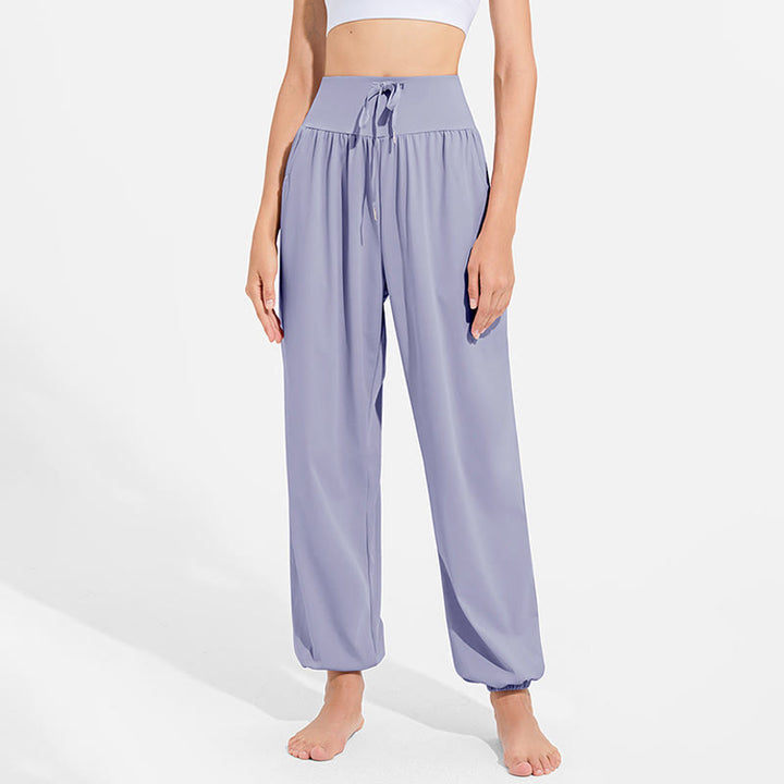 Pantaloni harem sportivi da yoga da donna con tasche e coulisse elastica in vita con motivo Buddha Stones - image 1