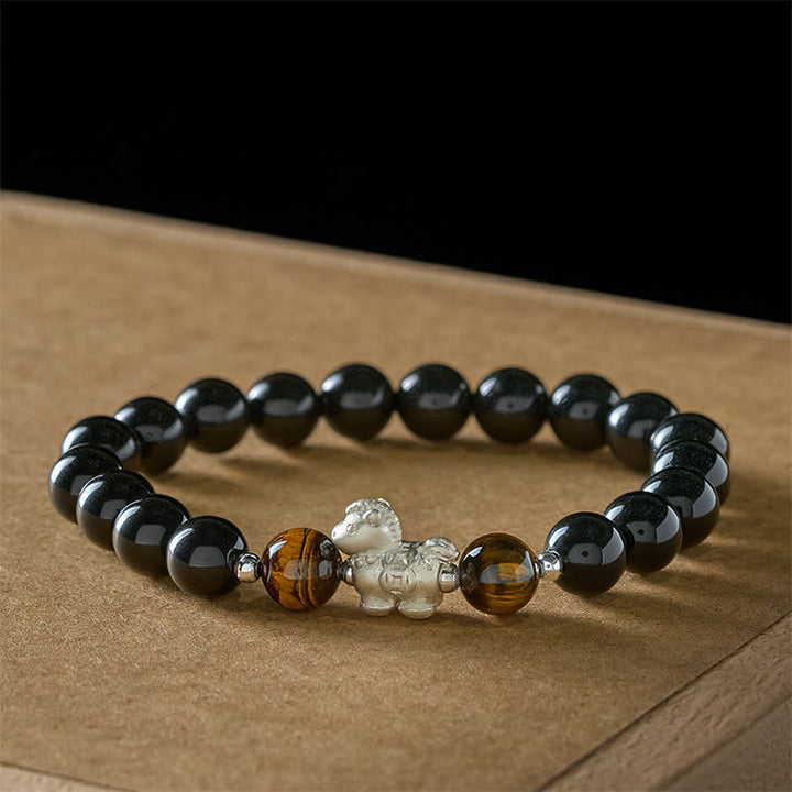Bracciale Buddha Stones Anno del Cavallo in Argento Sterling 999 con Ciondolo a Forma di Cavallo, Ossidiana Nera e Occhio di Tigre - image 1