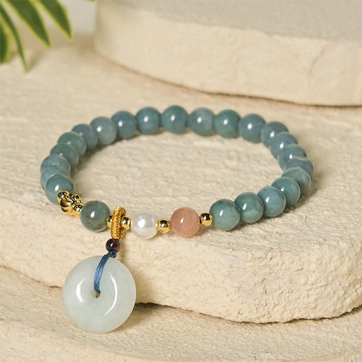 Braccialetto di buon auspicio con perline rotonde in giada e fibbia della pace Buddha Stones - image 3