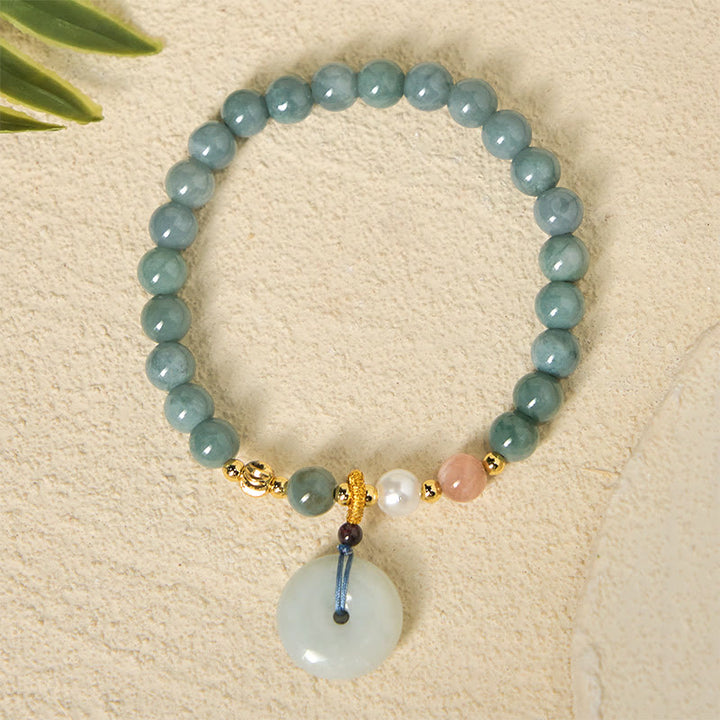 Braccialetto di buon auspicio con perline rotonde in giada e fibbia della pace Buddha Stones - image 4
