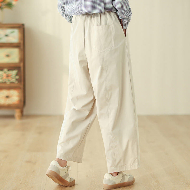 Pantaloni harem da donna alla caviglia con tasche e design semplice a linee geometriche, ispirati Buddha Stones. - image 2