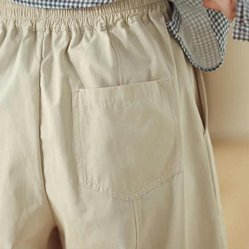 Pantaloni harem da donna alla caviglia con tasche e design semplice a linee geometriche, ispirati Buddha Stones. - image 4