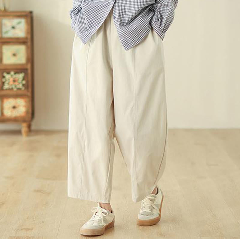 Pantaloni harem da donna alla caviglia con tasche e design semplice a linee geometriche, ispirati Buddha Stones. - image 1