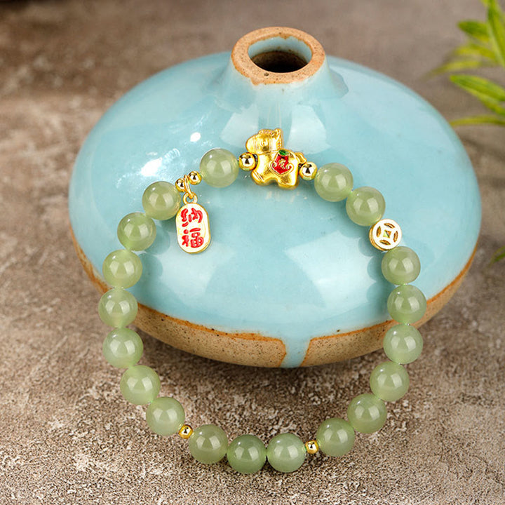 Buddha Stones Bracciale dell'abbondanza in giada di Hetian dell'anno del cavallo - image 2
