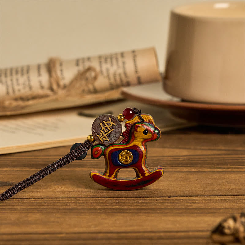 Buddha Stones Anno del Cavallo Arcobaleno Eucalipto Piccola Foglia Sandalo Rosso Legno di Tiglio Ebano Intagliato Portachiavi Positivo - image 1