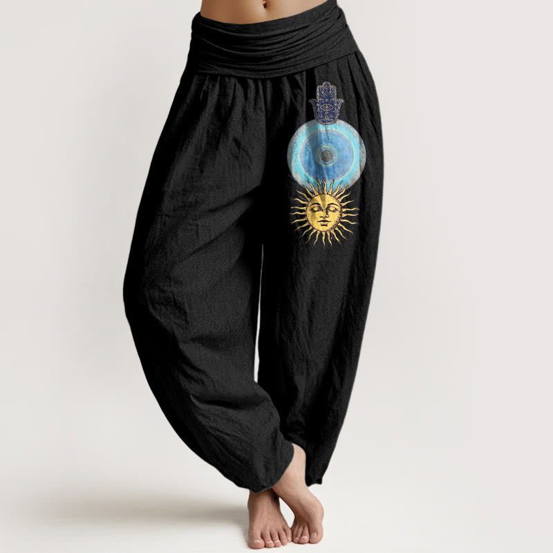 Buddha Stones Pantaloni harem da donna in puro cotone con elastico in vita, stile minimalista, motivo mano di Hamsa e sole - Nero - US16, UK/AU20, EU48 (3XL) - image 0
