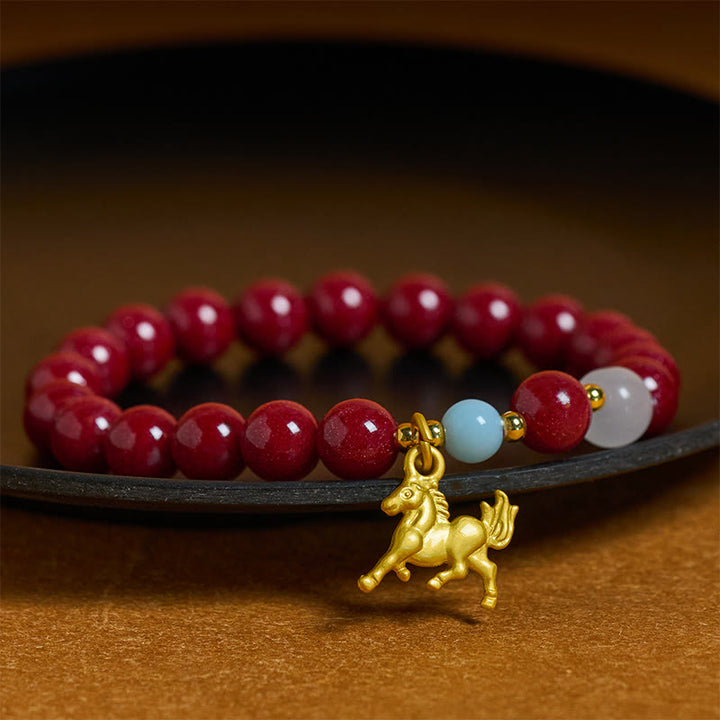 Braccialetto della benedizione del cinabro con ciondolo del cavallo in corsa dell'anno del cavallo Buddha Stones - 10 millimetri - Cinabro (circonferenza del polso: 14-16 cm) - image 0