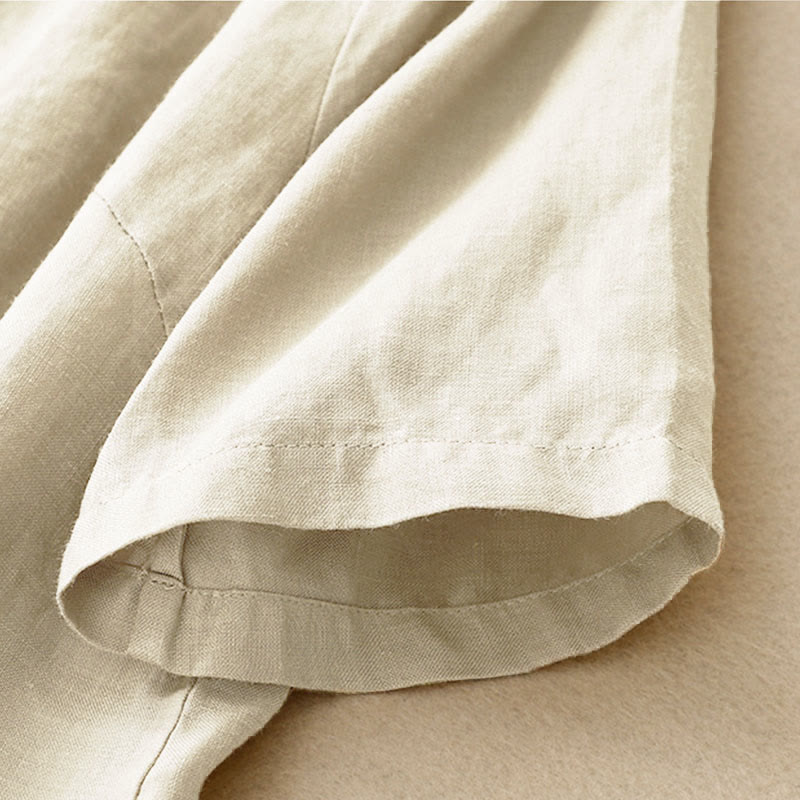 Camicia da donna estiva Buddha Stones a maniche corte con colletto alla coreana, spacchi laterali e chiusura con bottoni a rana. - image 1