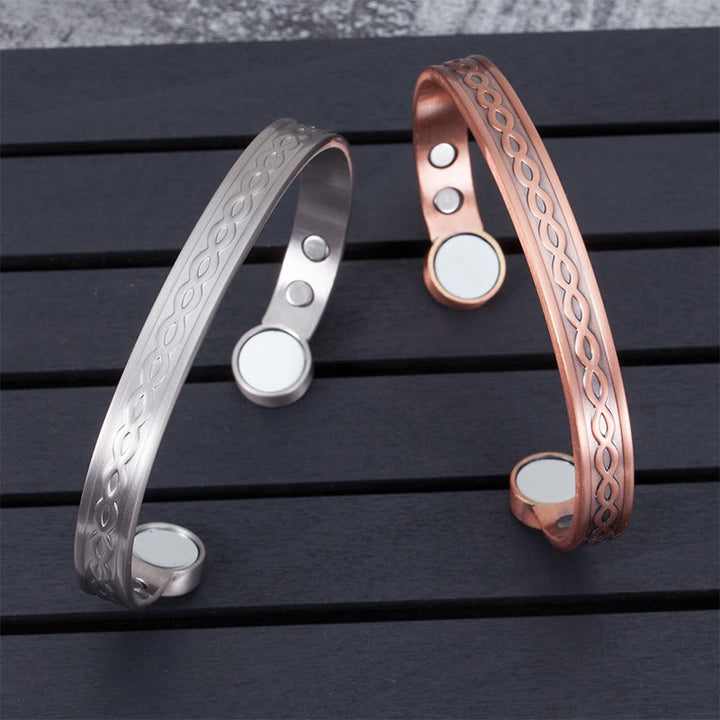 Buddha Stones Bracciale rigido aperto con motivo ad anelli intrecciati in rame, equilibrio e fortuna - image 0