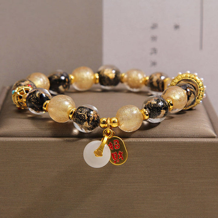 Buddha Stones Braccialetto di benedizione con fibbia per la pace e perline di vetro Liuli in oro nero che attraggono ricchezza - 14-16 cm - image 0