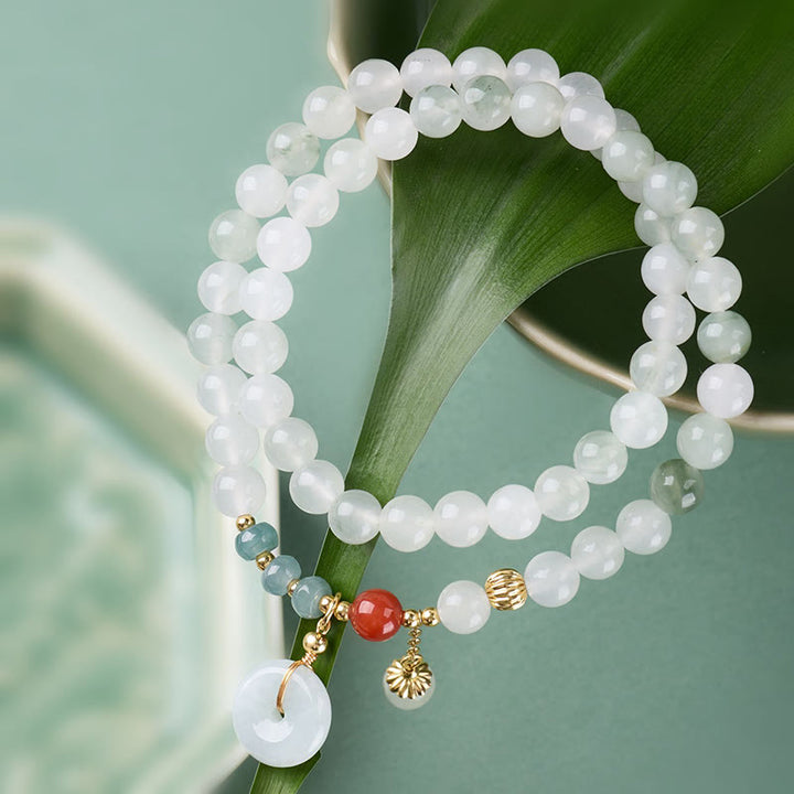 Buddha Stones Braccialetto a doppio giro con fibbia della pace in giada e fortuna e abbondanza - image 1