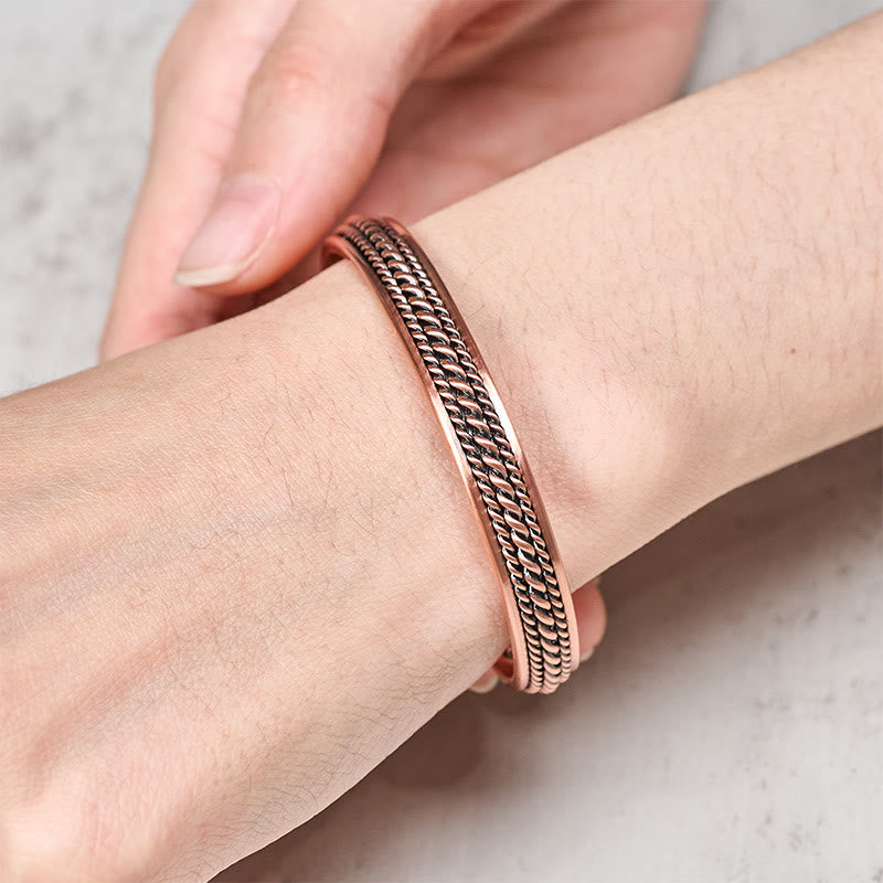 Buddha Stones Bracciale rigido aperto con polsino e portafortuna in rame con design semplice e intrecciato - image 3