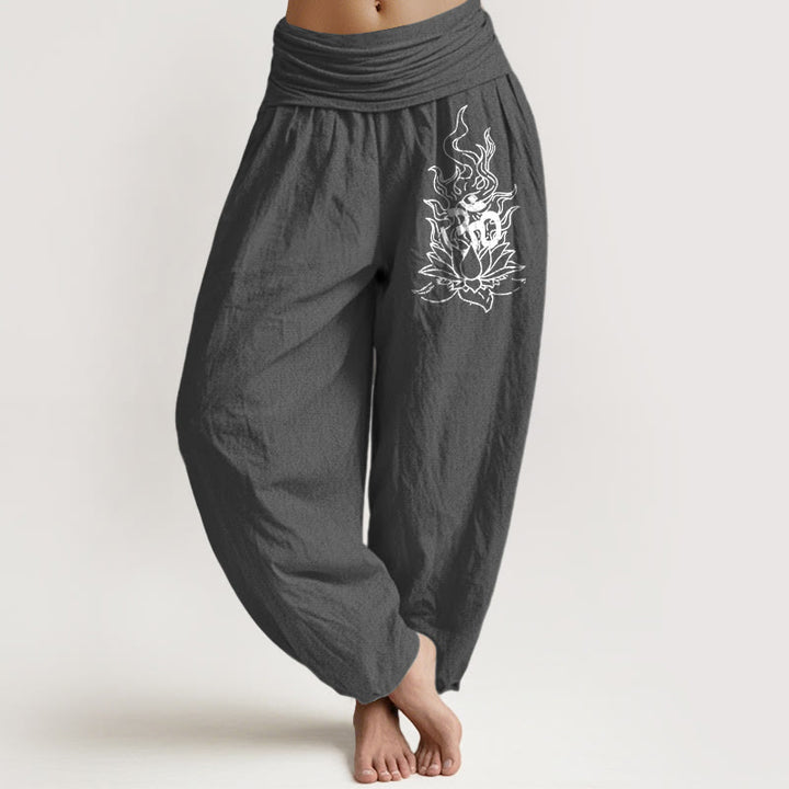 Buddha Stones Pantaloni harem da donna con elastico in vita, modello minimalista con simbolo Om e fiamma di loto, in puro cotone - image 8