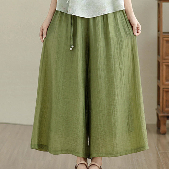 Buddha Stones Pantaloni Capri a gamba larga da donna con elastico in vita e tinta unita - image 1