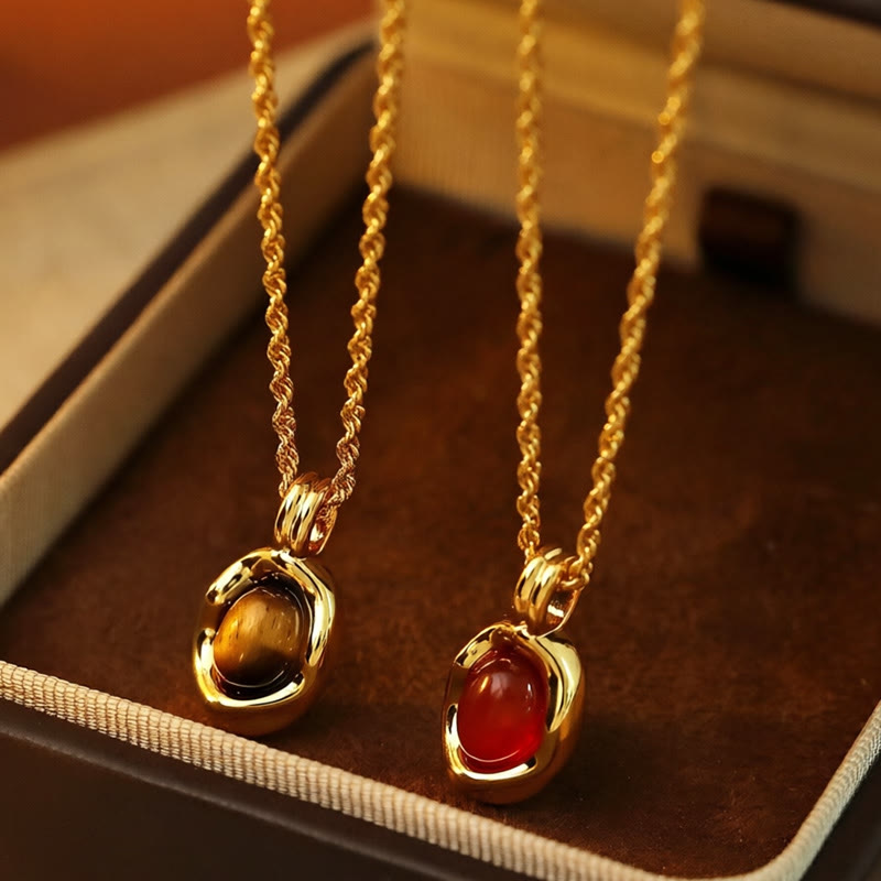 Buddha Stones Collana con ciondolo in agata rossa occhio di tigre e catena placcata oro rame. - image 0