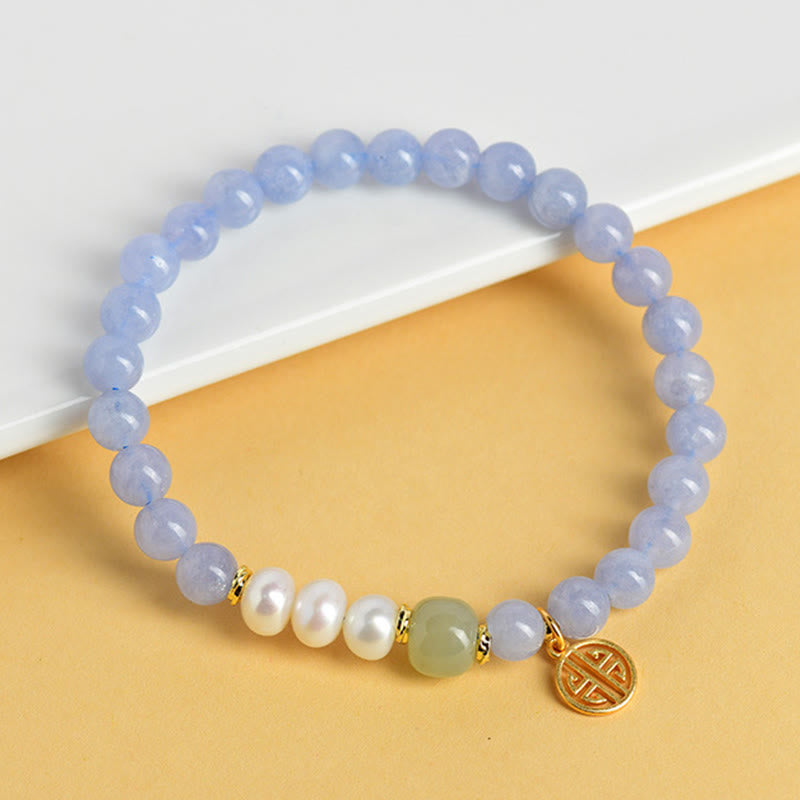 Buddha Stones Braccialetto energetico con perle di calcedonio blu - image 2