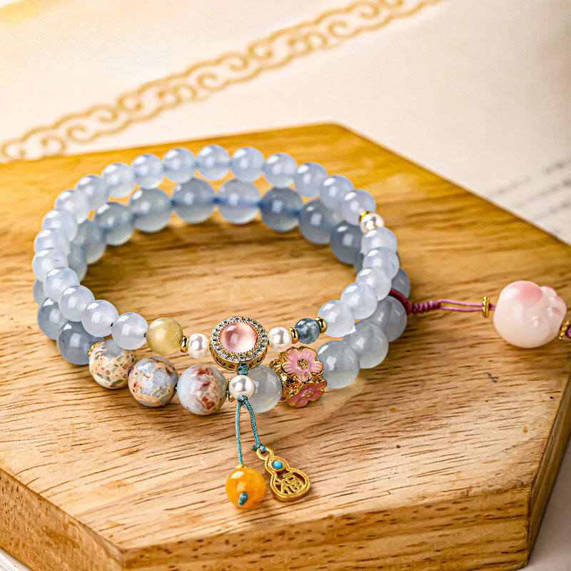Buddha Stones Braccialetto curativo a forma di zampa di gatto con carattere Fu in calcedonio blu - Zampa di gatto (circonferenza del polso: 14-15 cm) - image 0