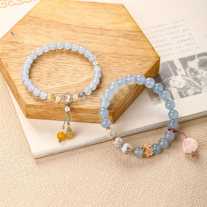 Buddha Stones Braccialetto curativo a forma di zampa di gatto con carattere Fu in calcedonio blu - image 5