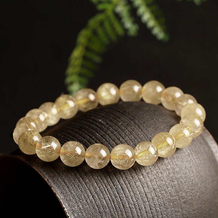 Braccialetto di protezione e buon auspicio in quarzo rutilato naturale Buddha Stones - Quarzo rutilato dorato (circonferenza polso 14-16,5 cm) - image 0