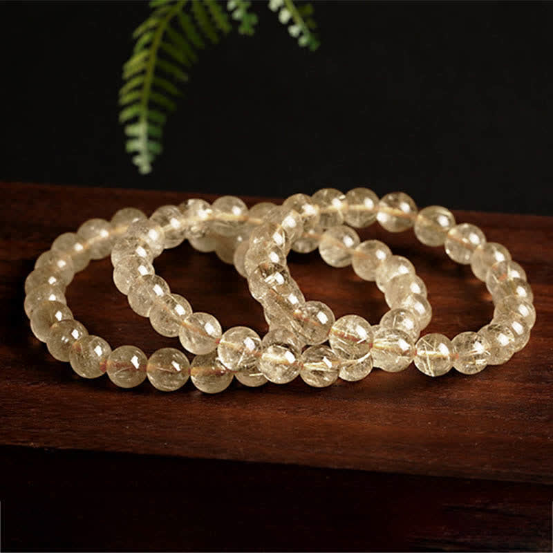 Braccialetto di protezione e buon auspicio in quarzo rutilato naturale Buddha Stones - image 4