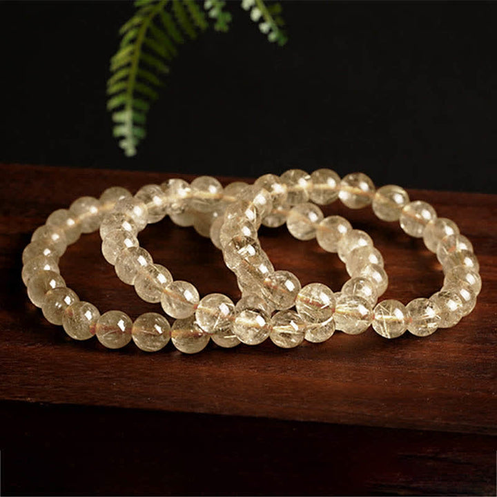 Braccialetto di protezione e buon auspicio in quarzo rutilato naturale Buddha Stones - image 4