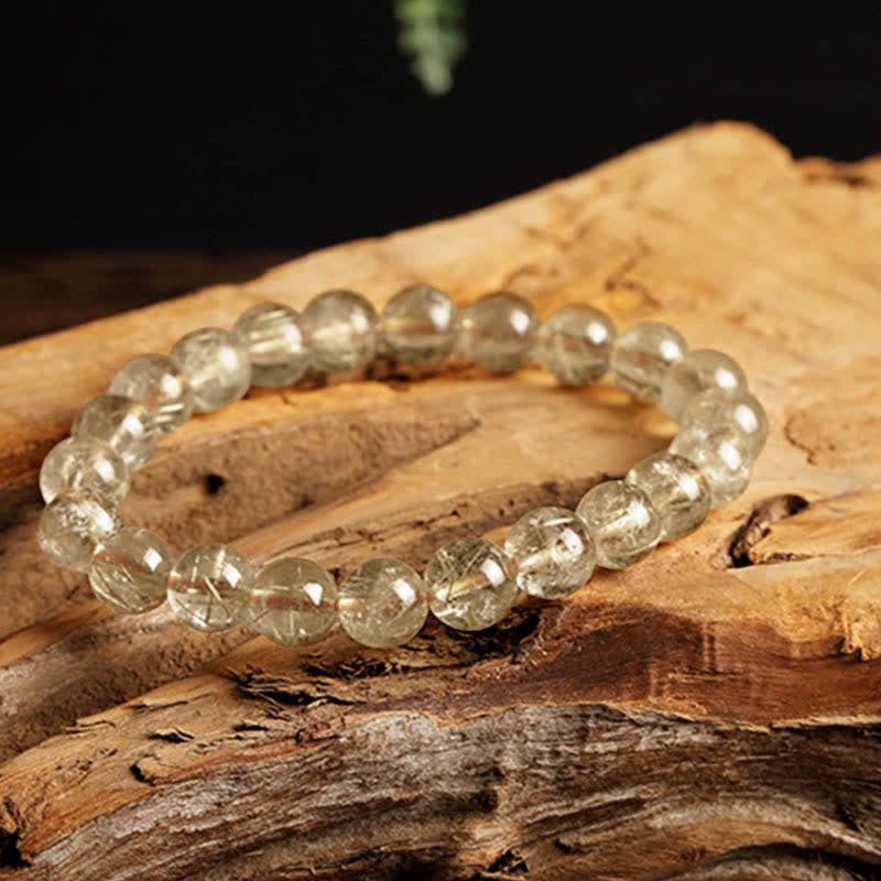 Braccialetto di protezione e buon auspicio in quarzo rutilato naturale Buddha Stones - image 3