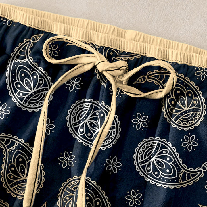 Buddha Stones Pantaloni da donna in puro cotone con elegante fantasia paisley, elastico in vita e tasche. - image 1
