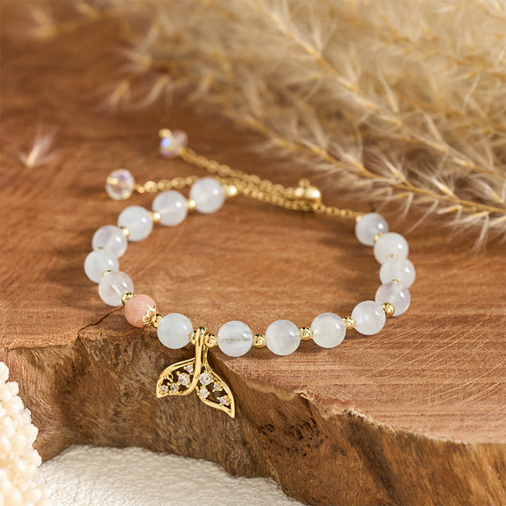 Buddha Stones Bracciale Serenity a coda di pesce in rame placcato oro con acquamarina naturale. - Acquamarina (Circonferenza del polso: 14-15 cm) - image 0