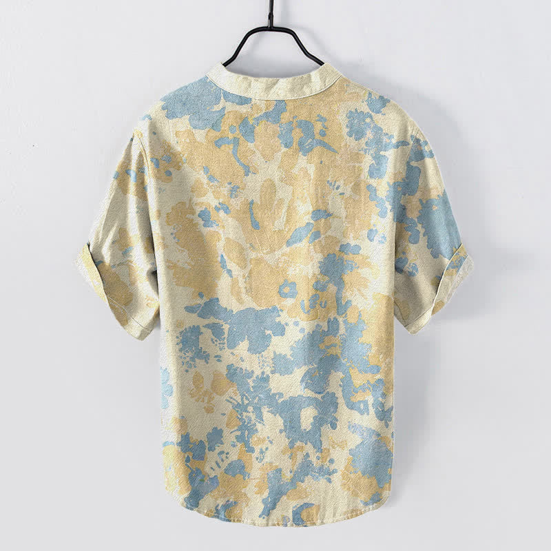 Buddha Stones Camicia Henley da uomo a maniche corte con bottoni a metà, in cotone e stampa floreale acquerellata. - image 1