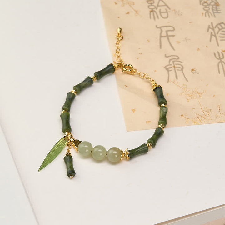 Buddha Stones Bracciale della pace con peridoto e perline di giada Hetian e mosca tampone di bambù. - Peridoto (circonferenza del polso 15-18 cm) - image 0